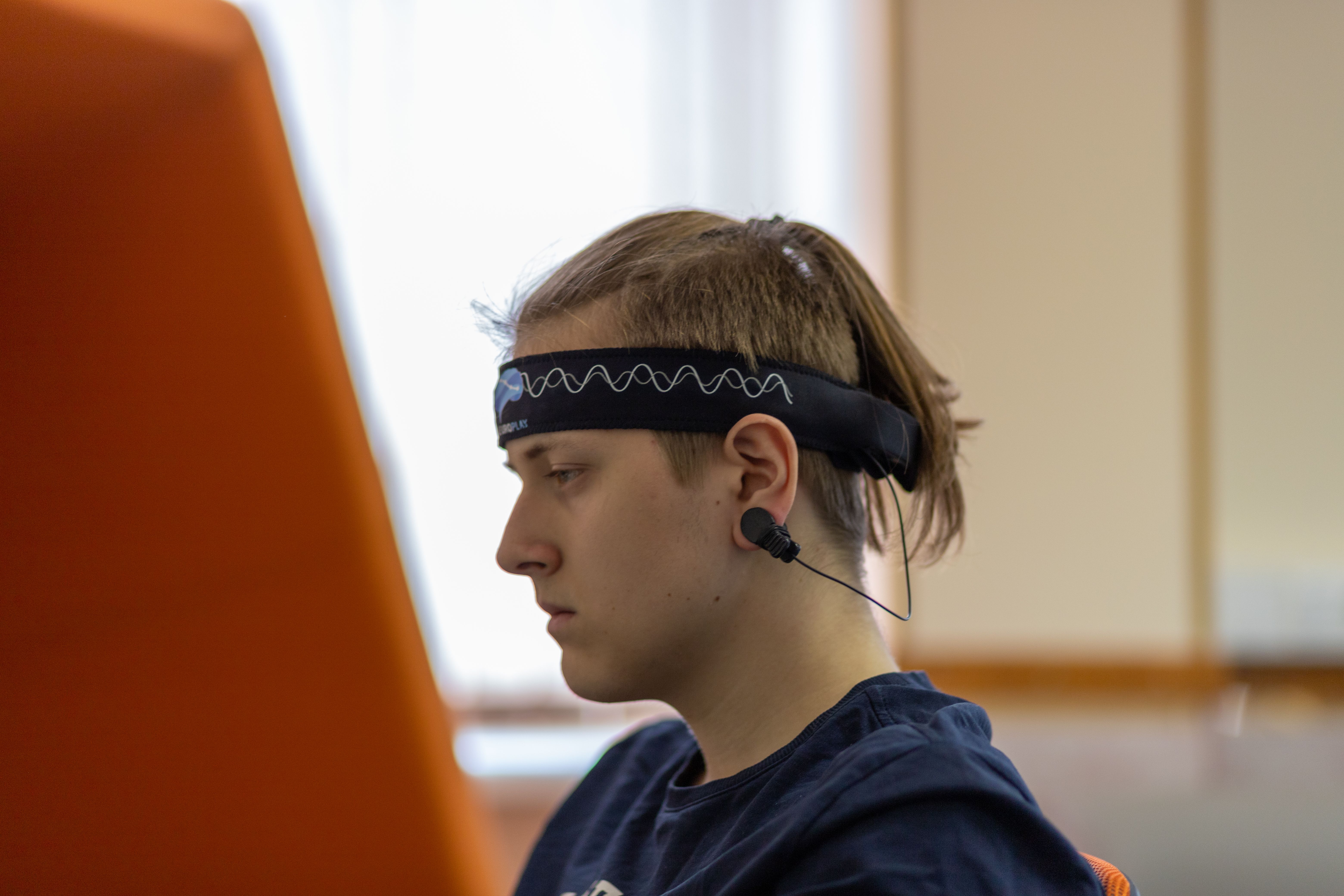 researcher studying neural patterns