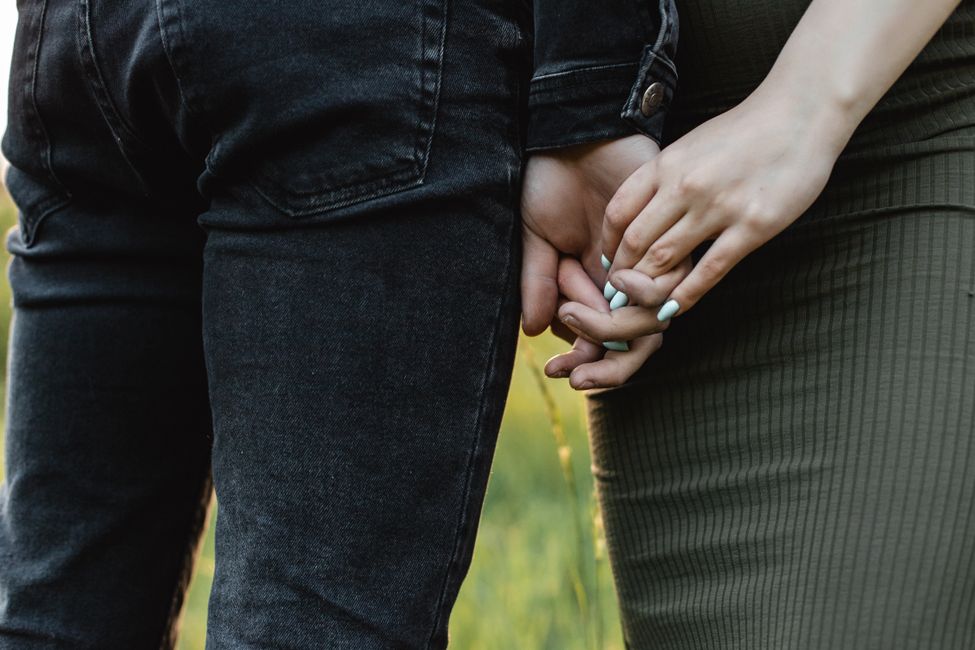 hands holding gently together