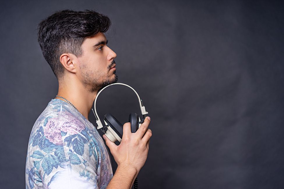 person listening with headphones