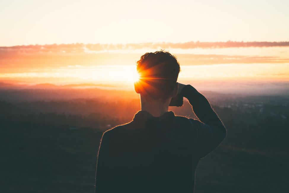 person looking toward light