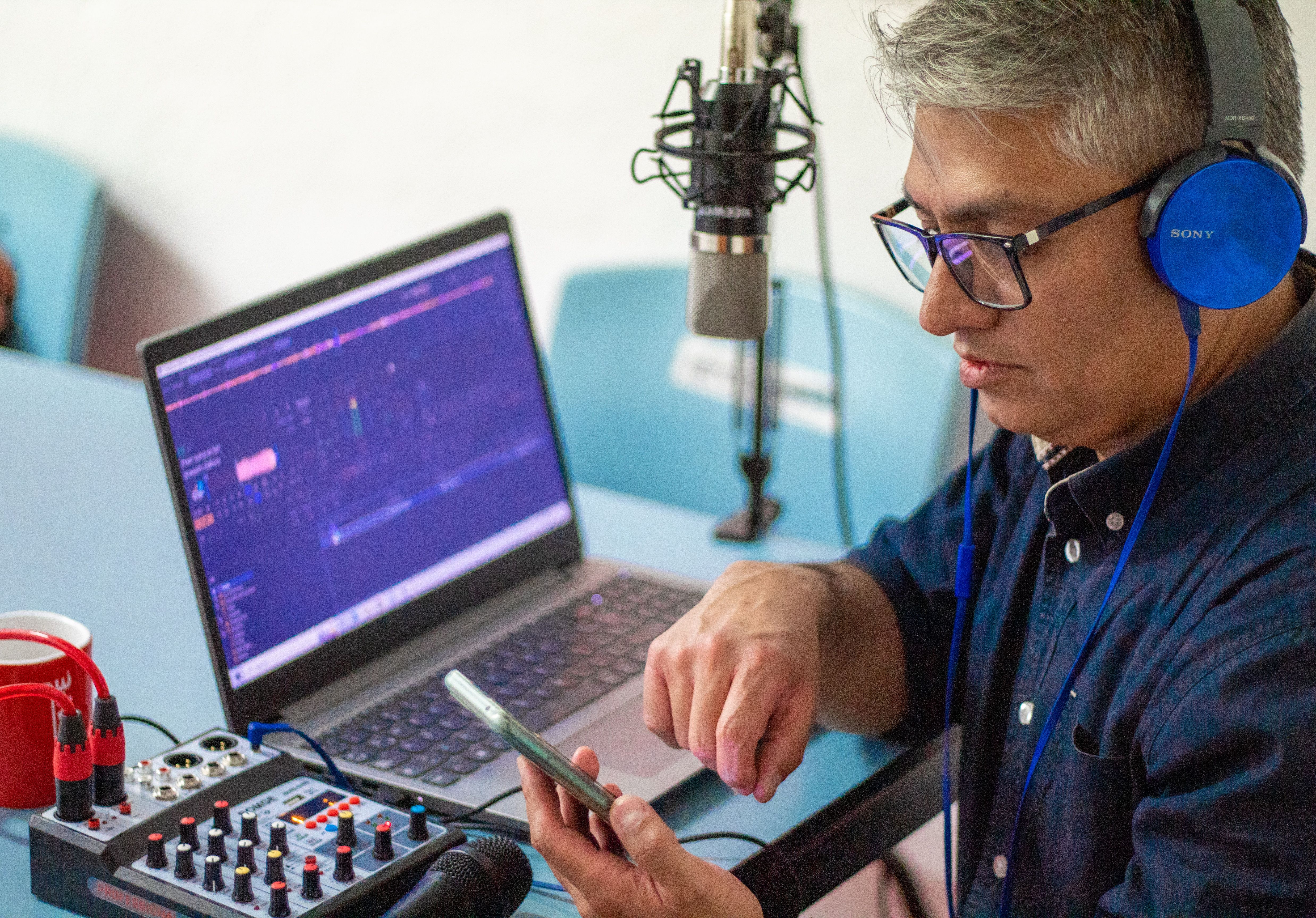 Podcaster editing audio content