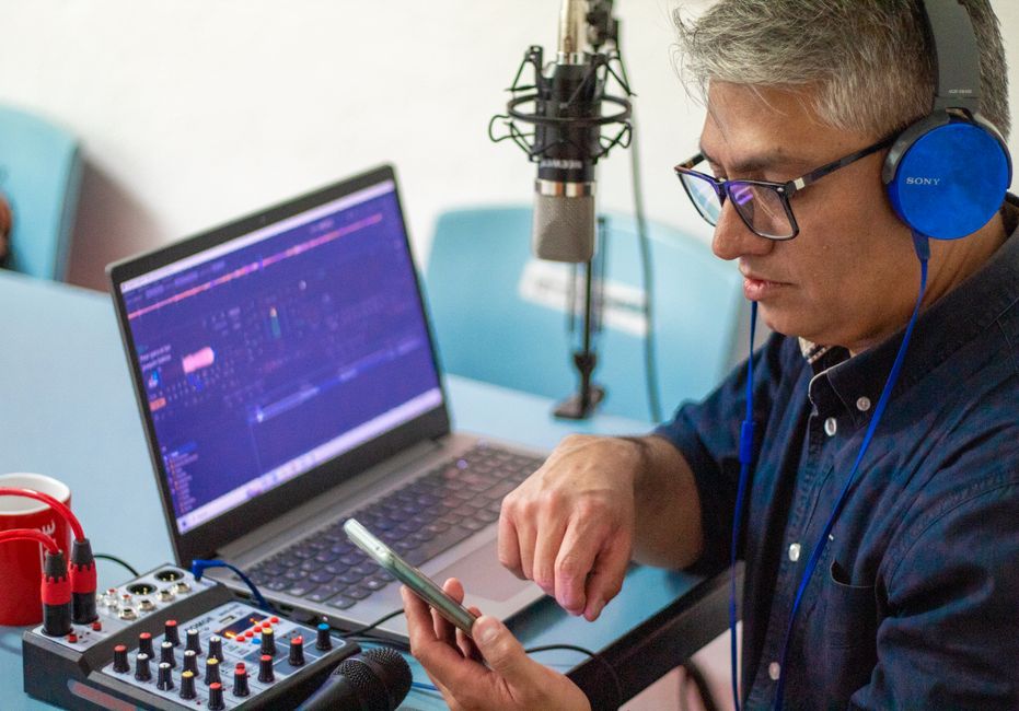 Podcaster editing audio content