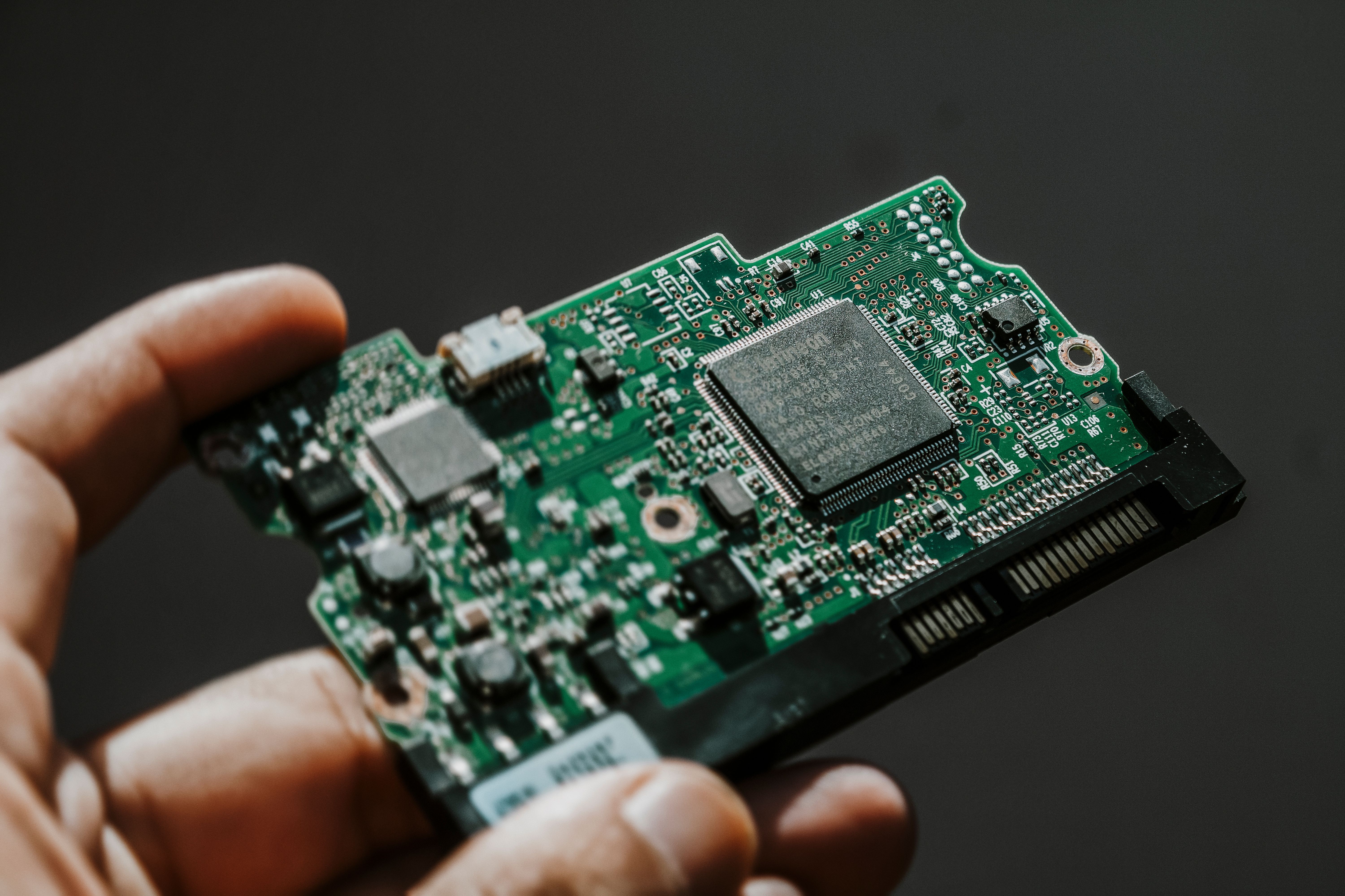 scientist holding microchip device