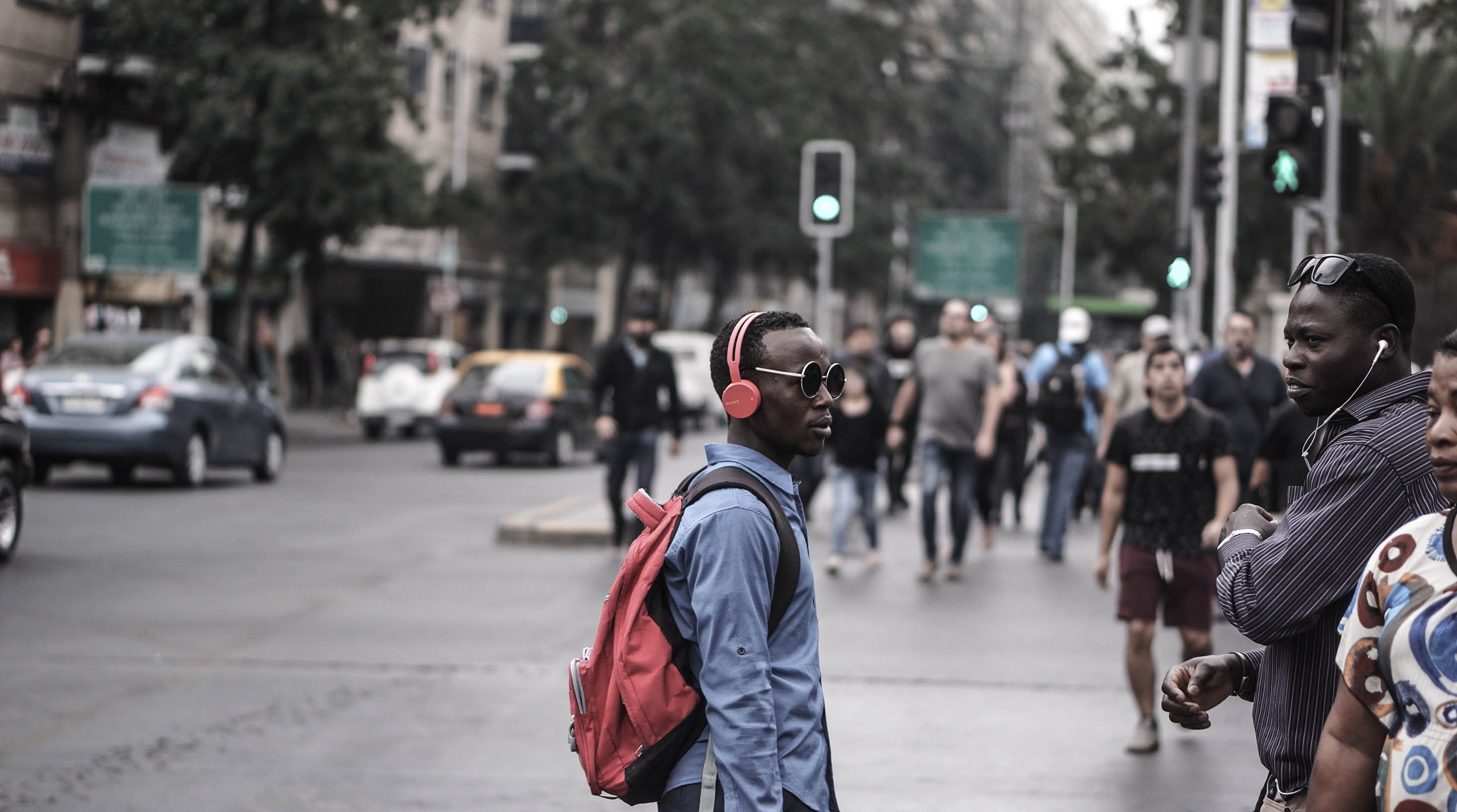 People listening with headphones