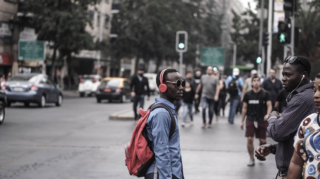 People listening with headphones