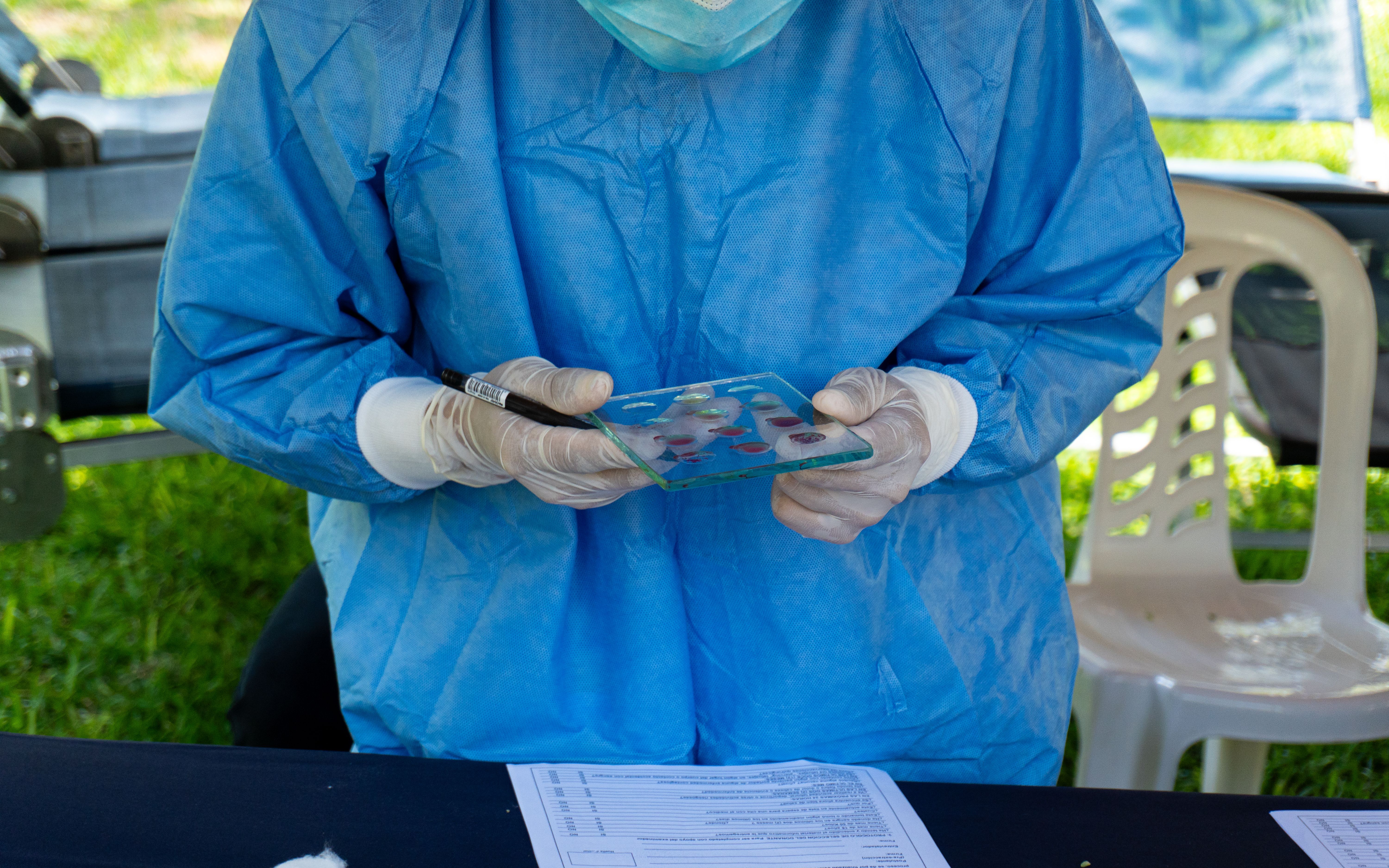 person providing saliva sample