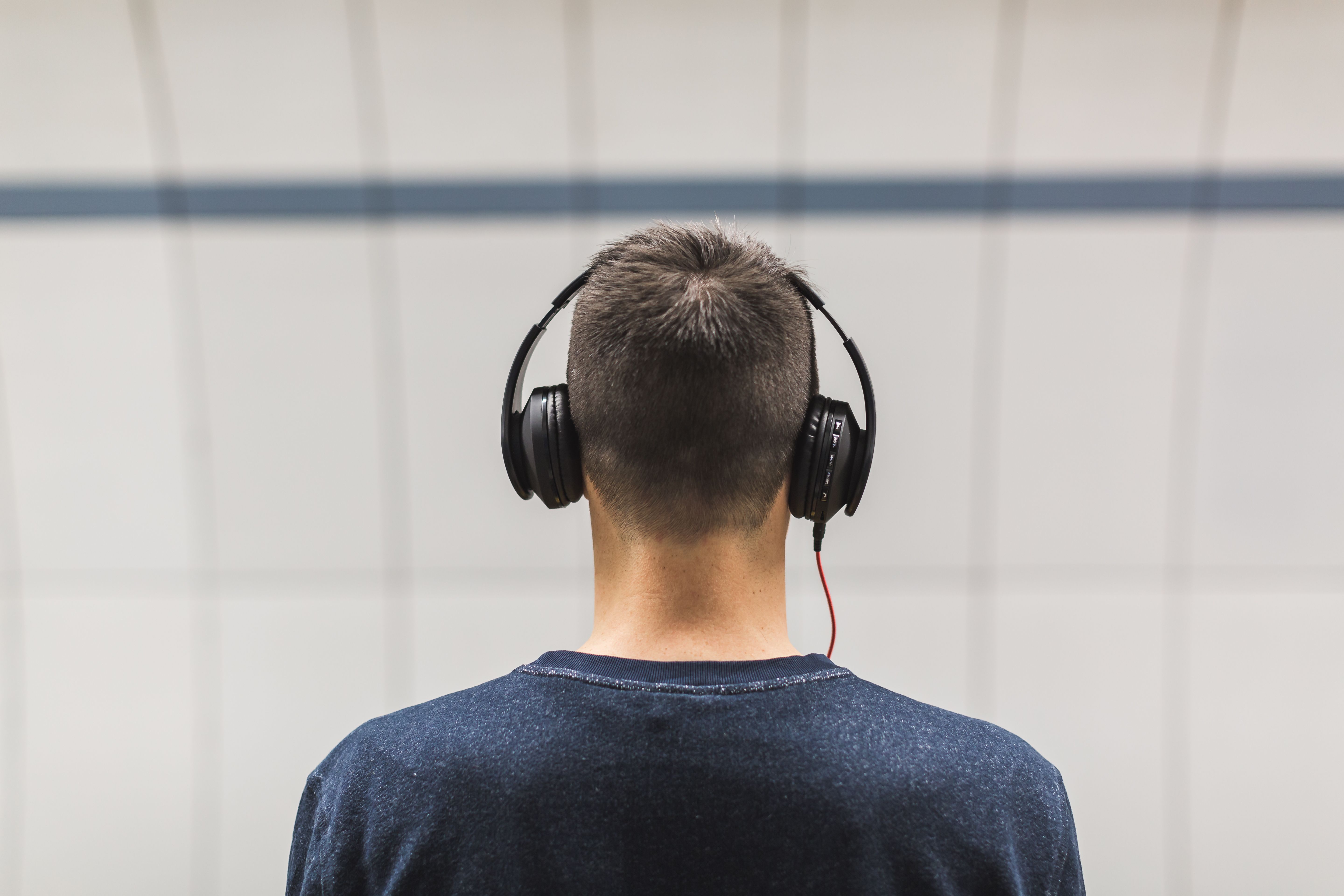 Person listening with headphones