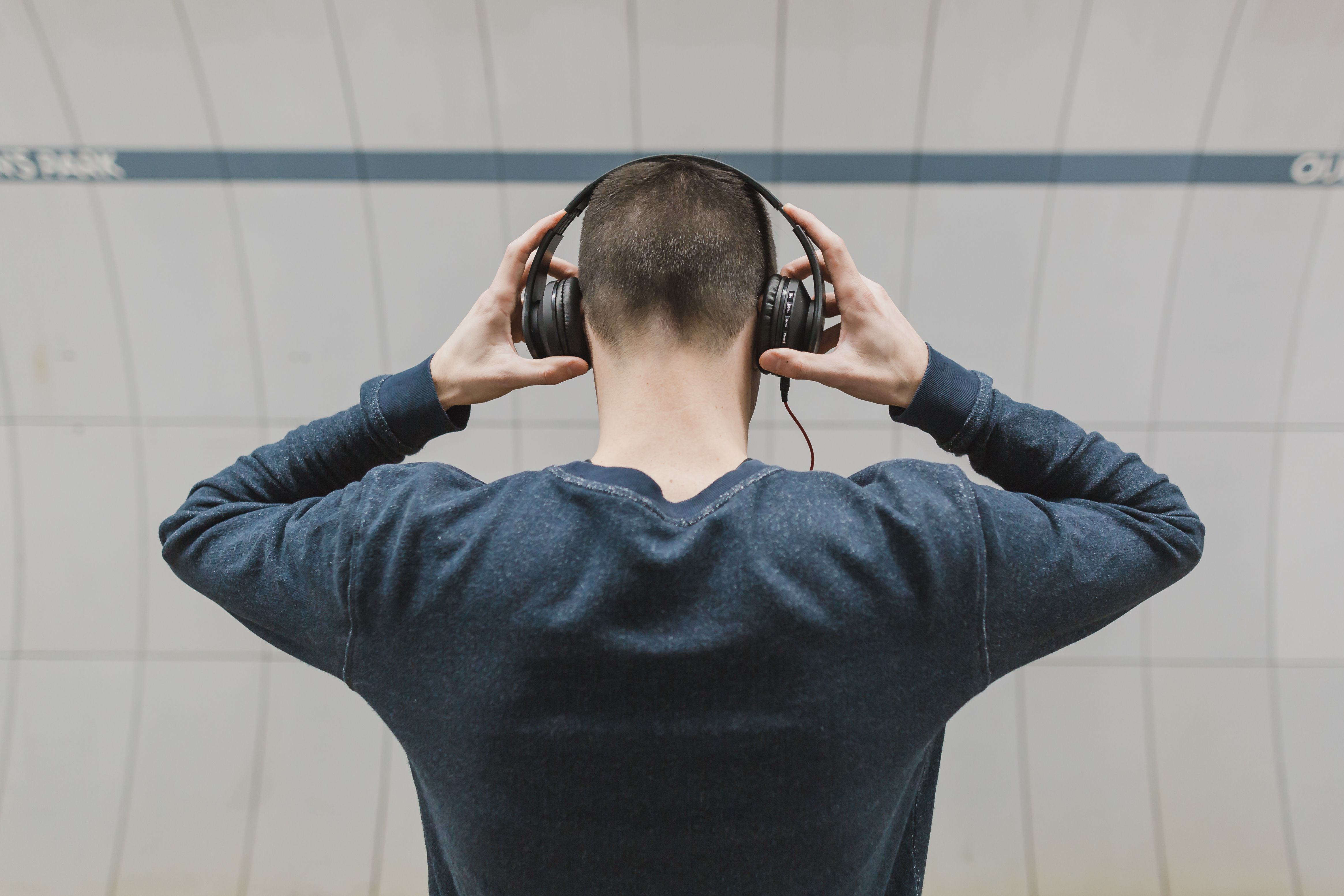 Person listening with headphones