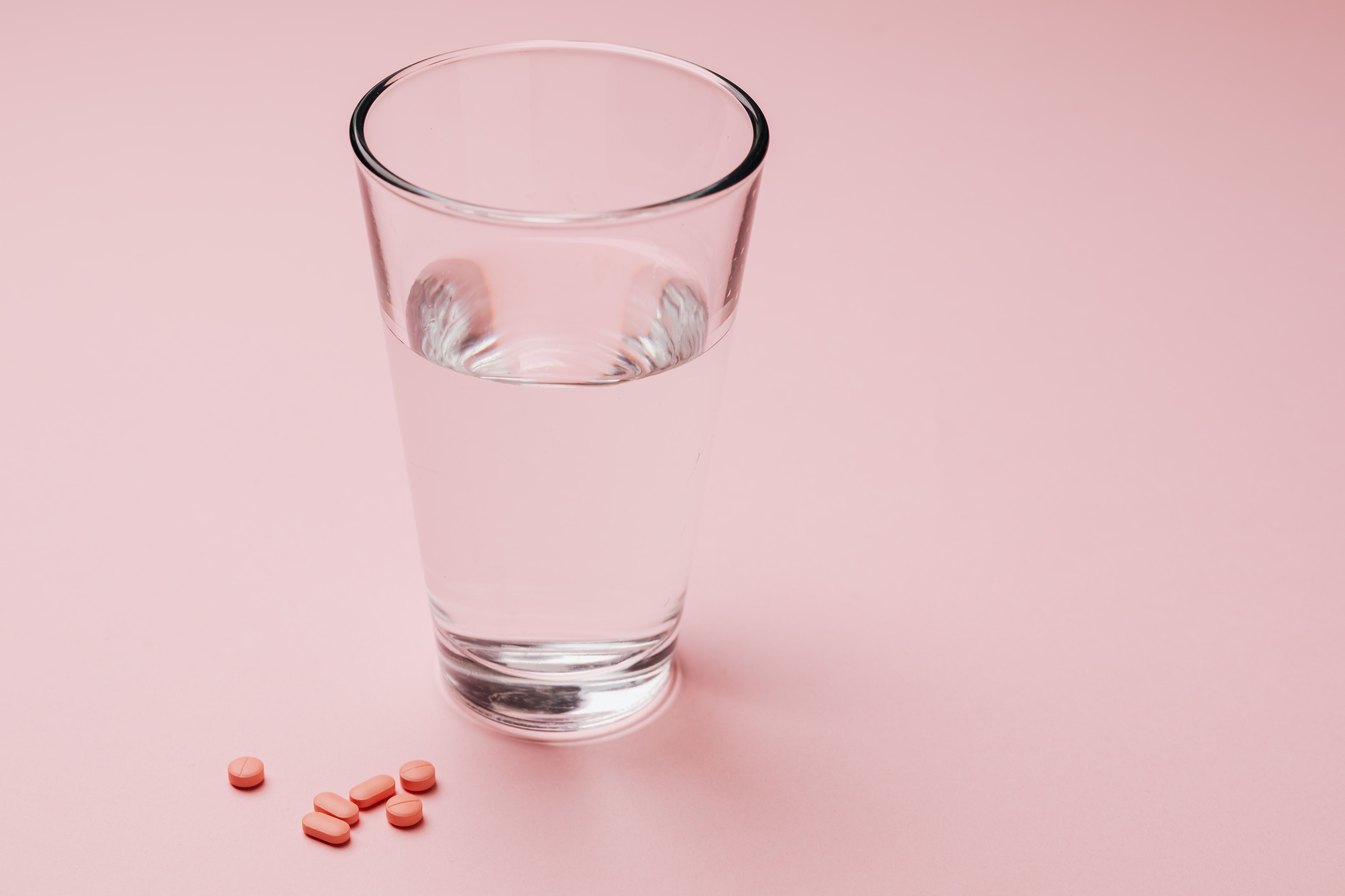 pills and glass of water