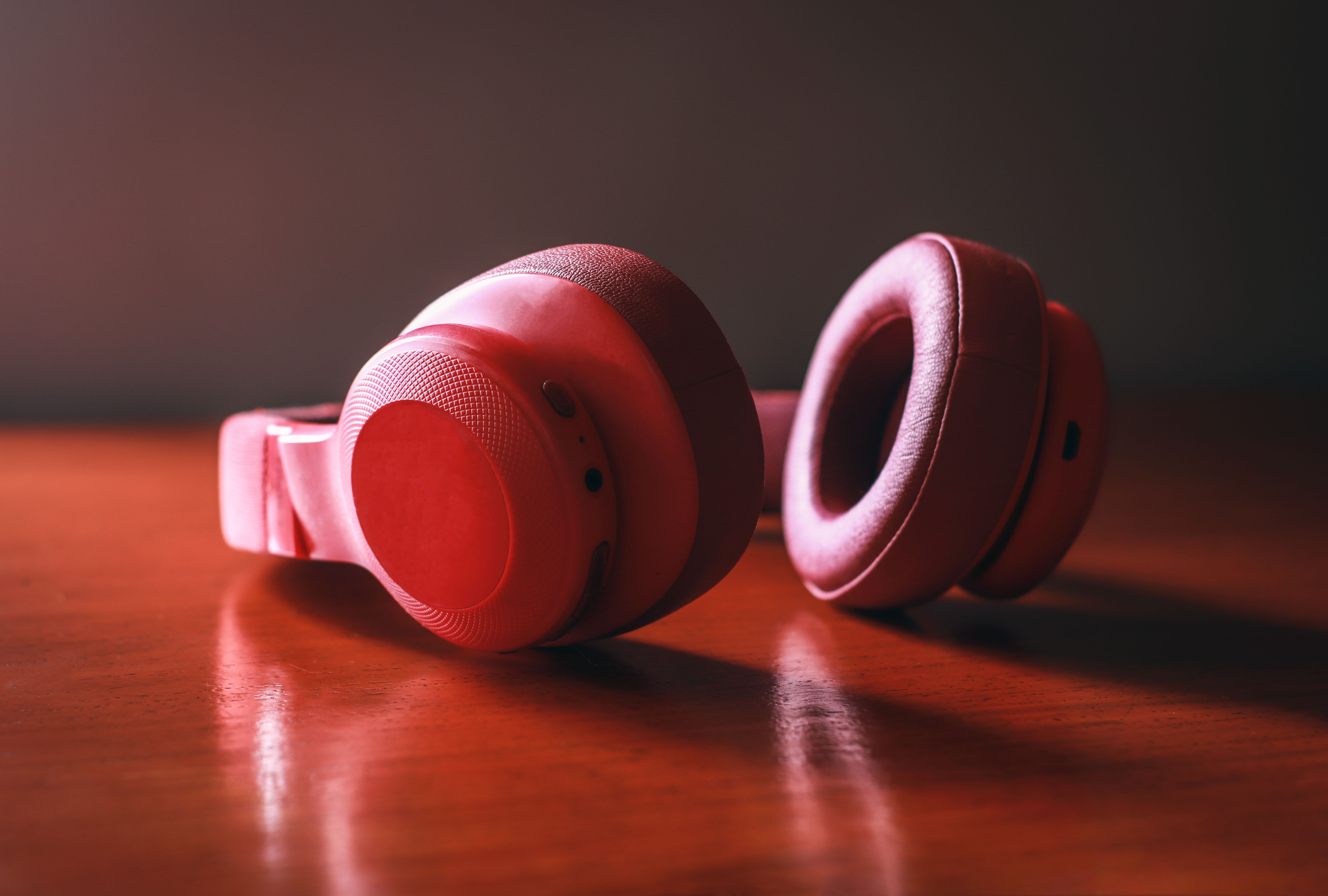 headphones on wooden surface