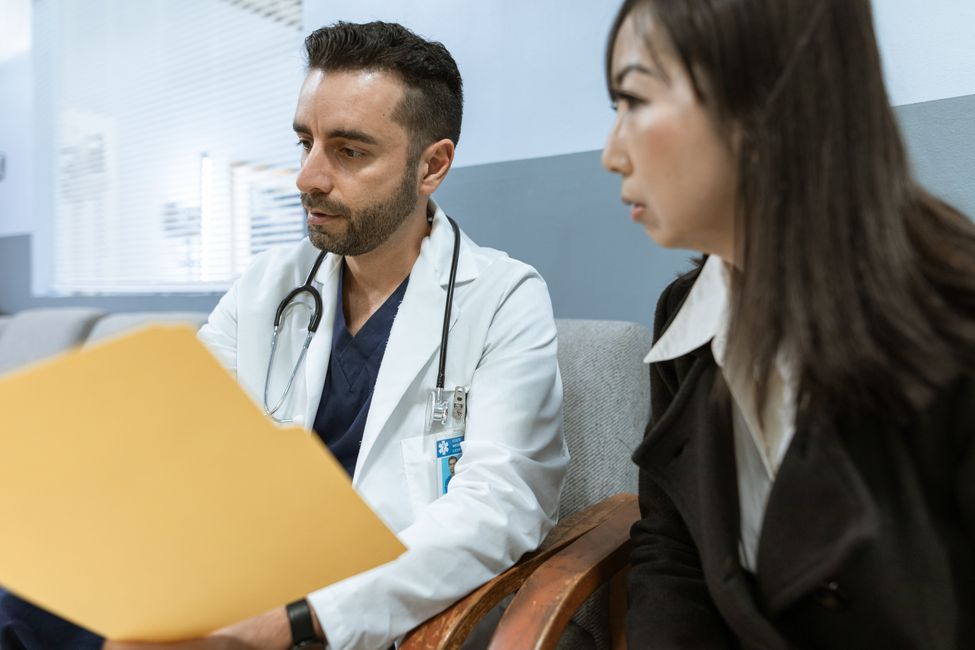 doctor and older patient talking