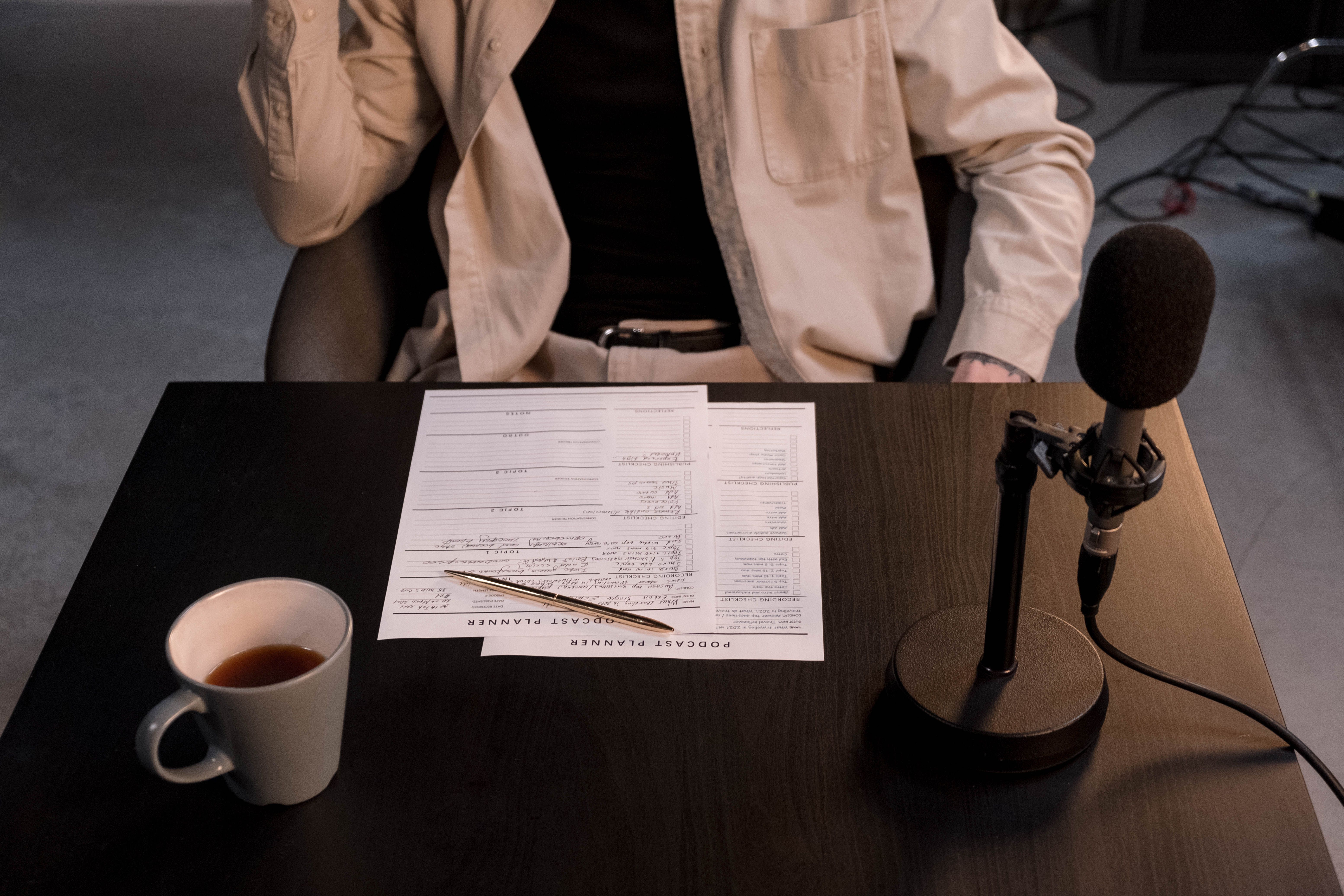 Podcast microphone and coffee