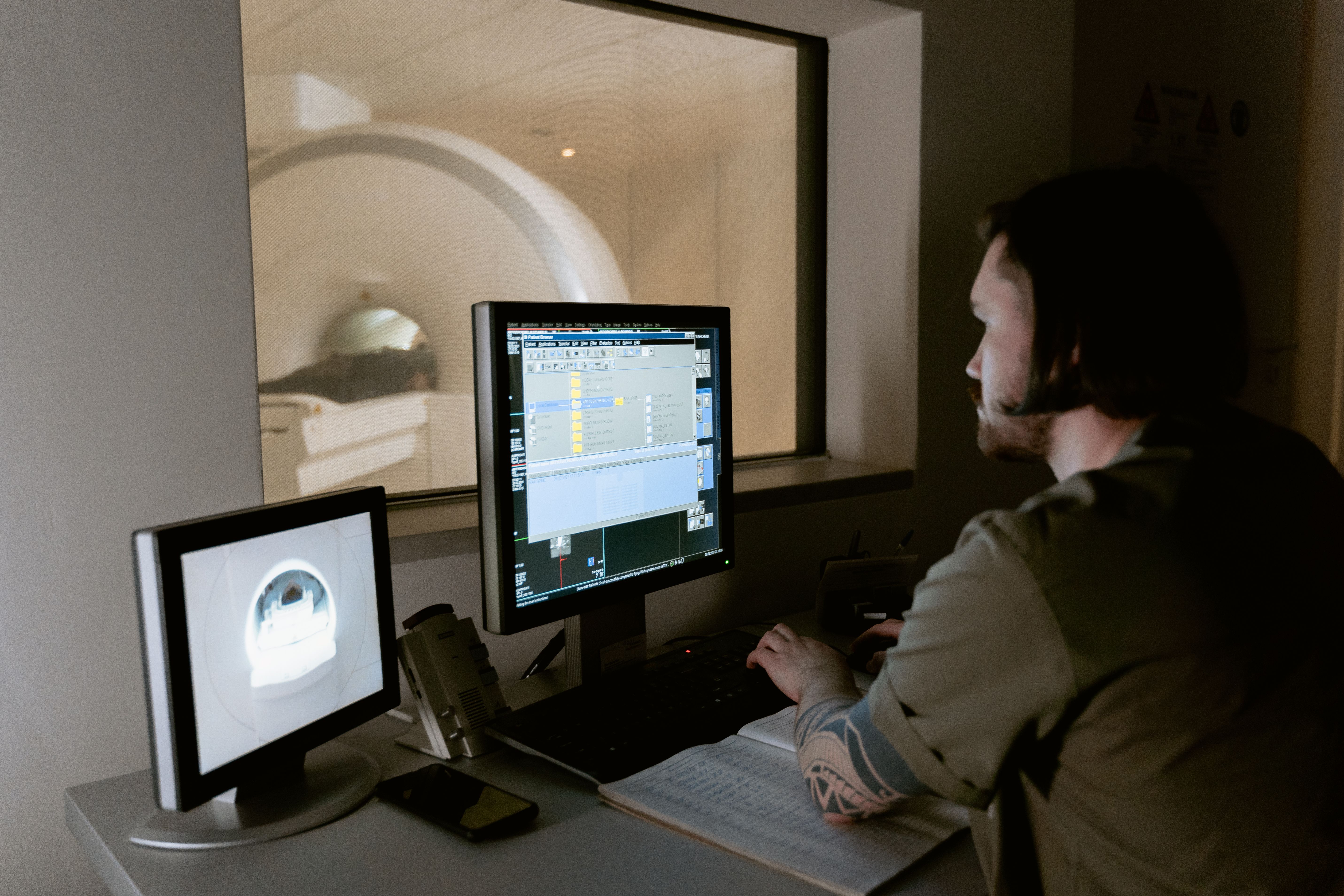 scientist examining brain scan