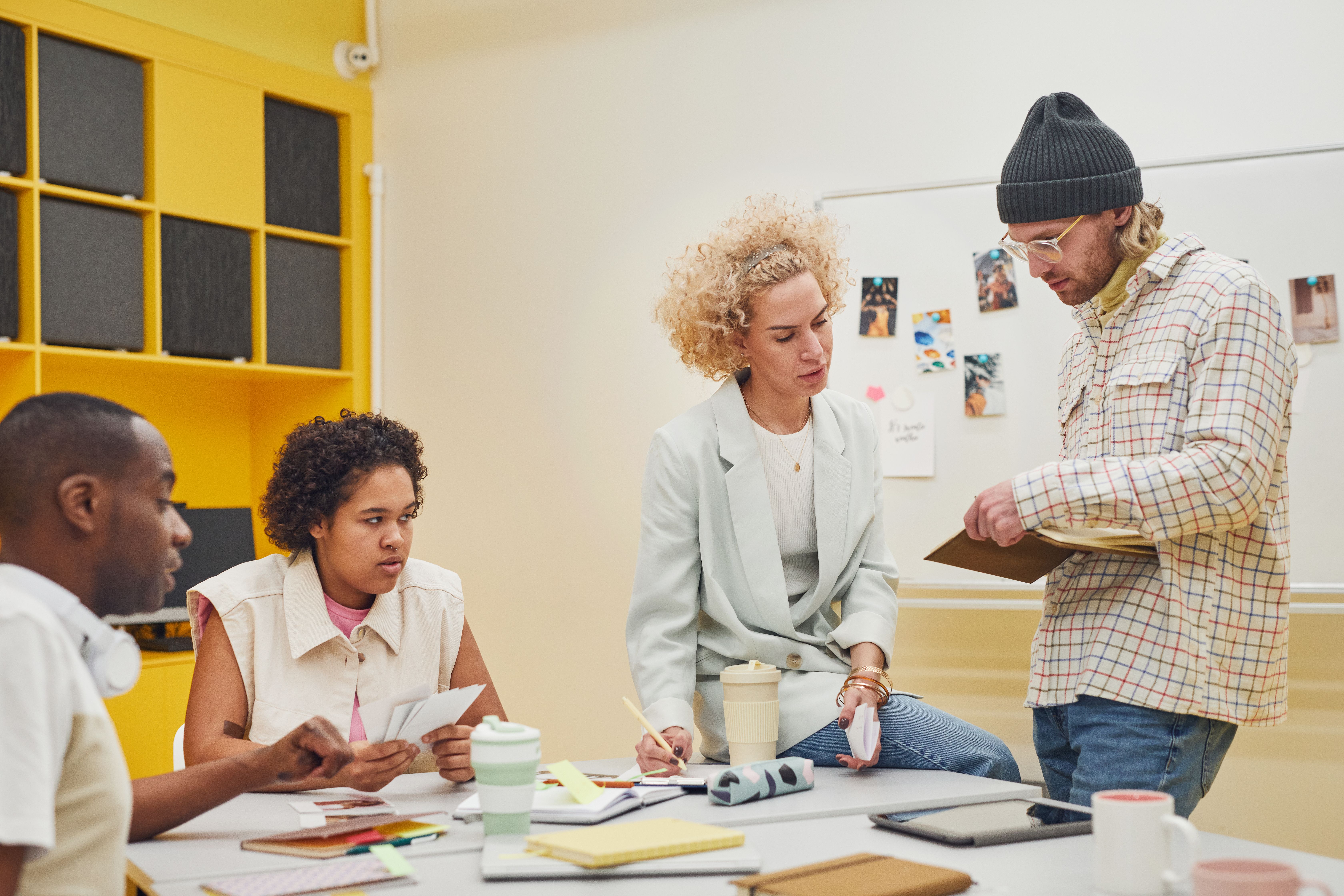 people collaborating at table