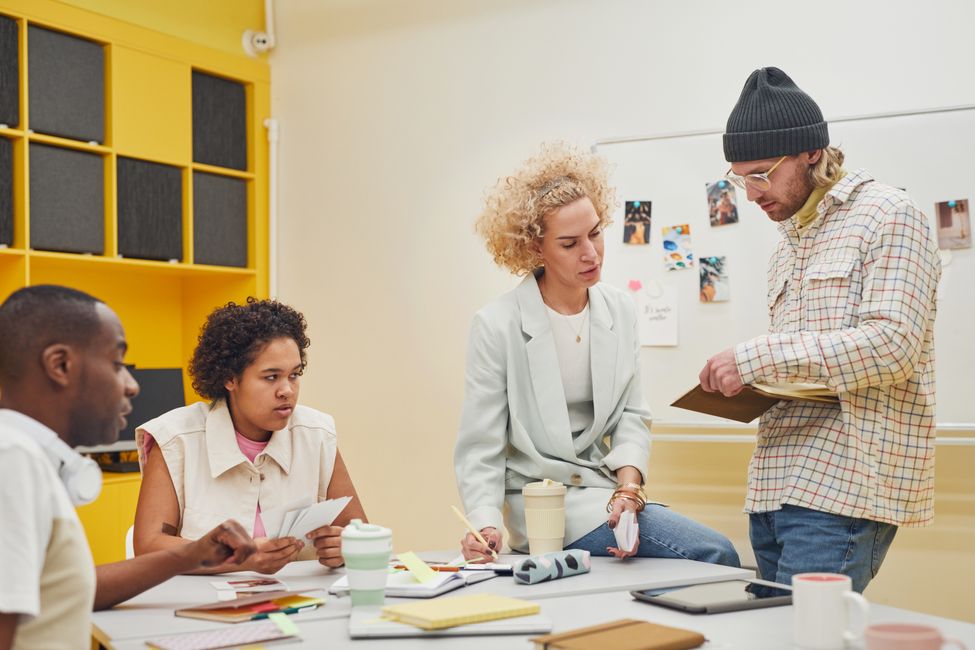 people collaborating at table