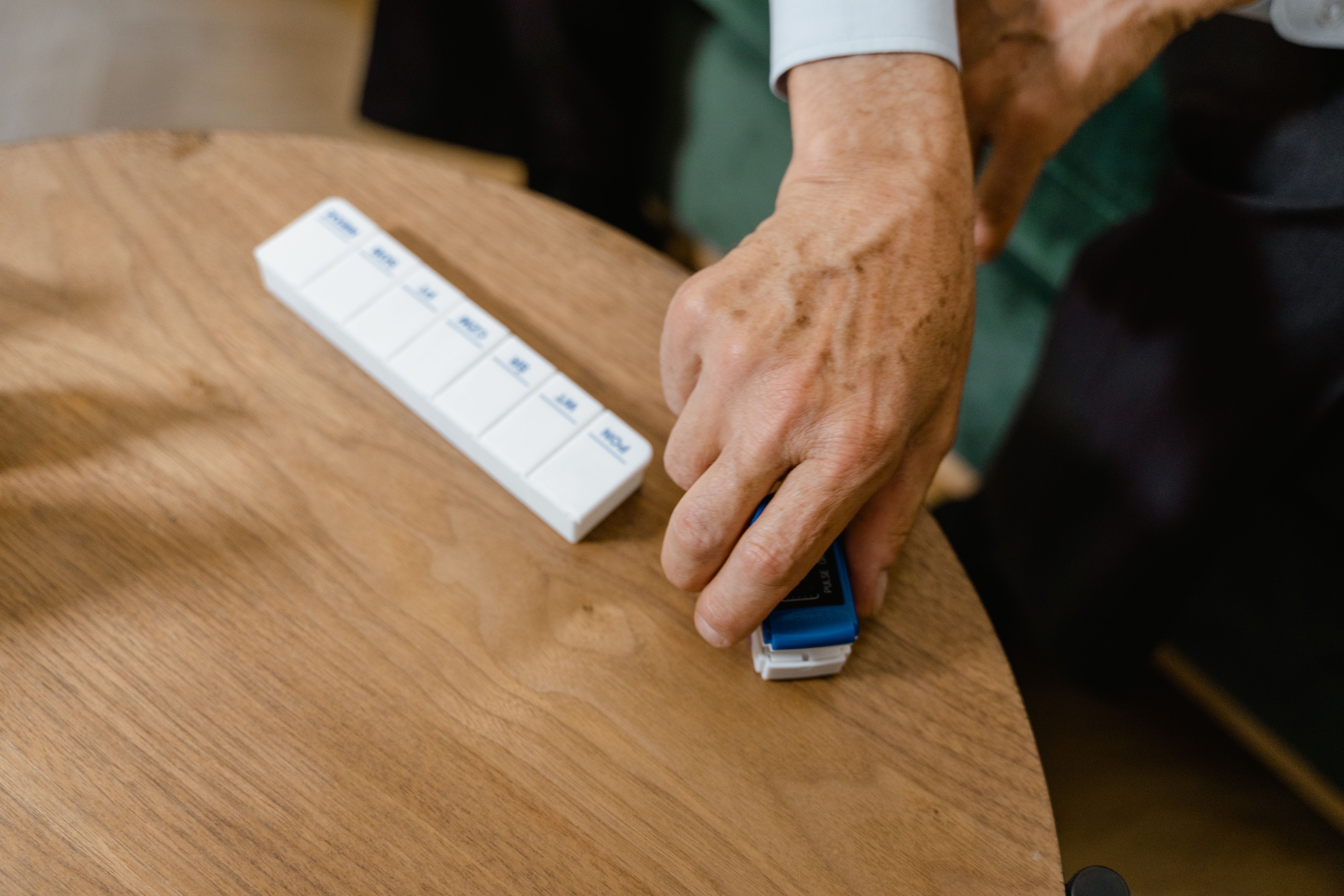 elderly hands holding heart