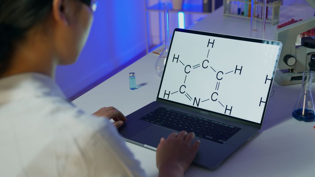 researcher examining data screen