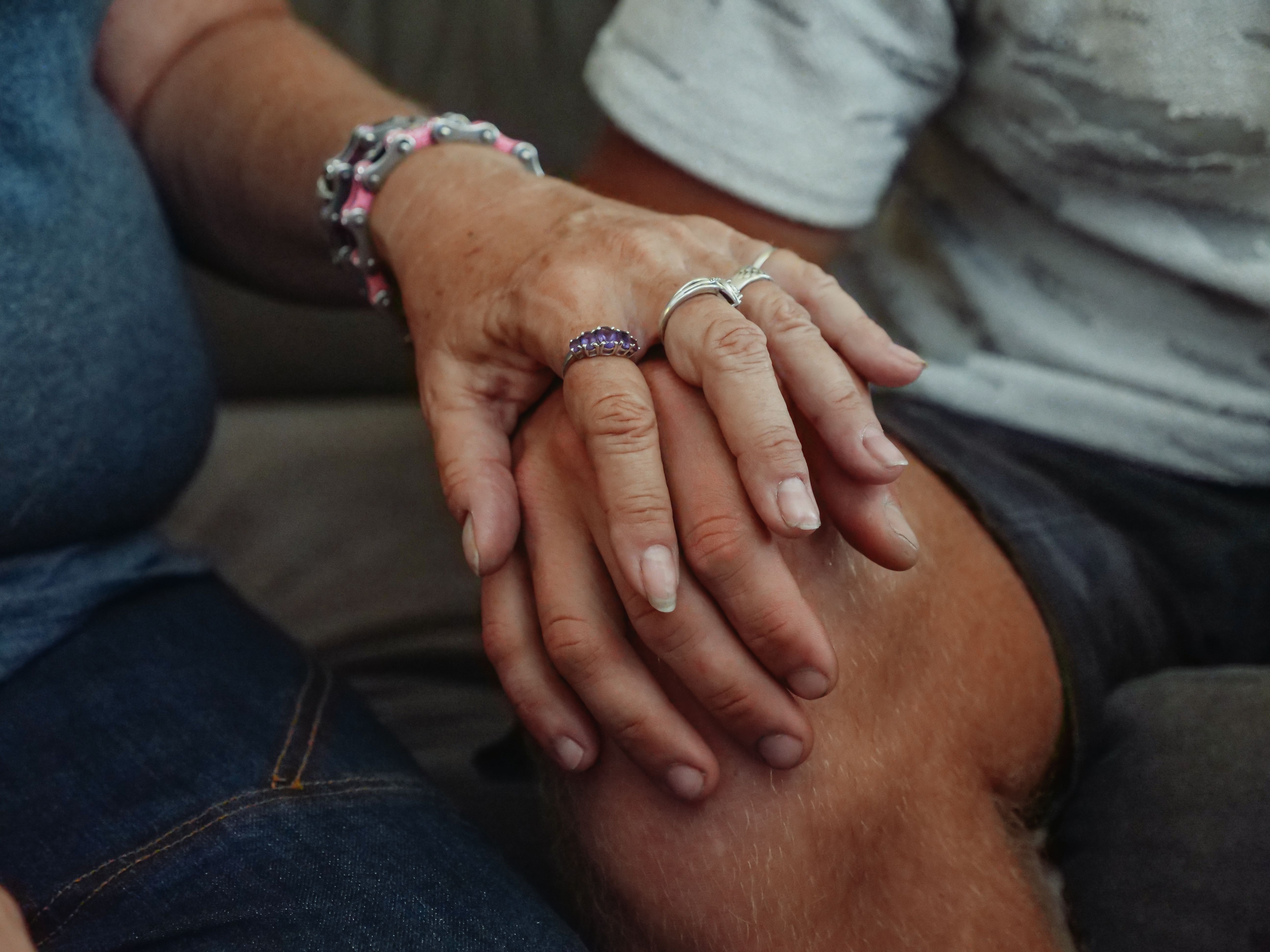 hands holding gently together