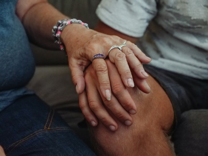 hands holding gently together