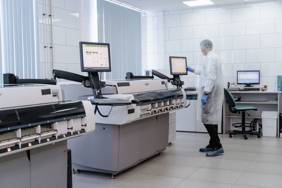 researcher looking at monitor